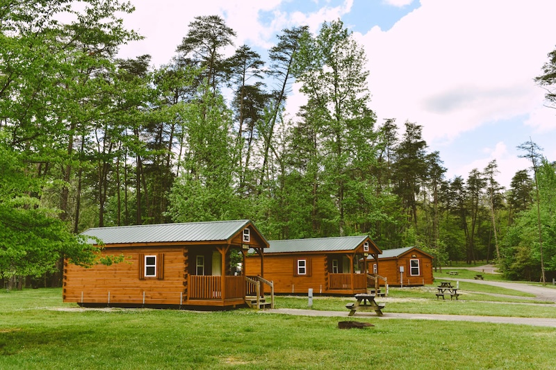 Deam Lake SRA, Indiana, cabins on a green lawn Deam Lake SRA, Indiana, cabins on a green lawn