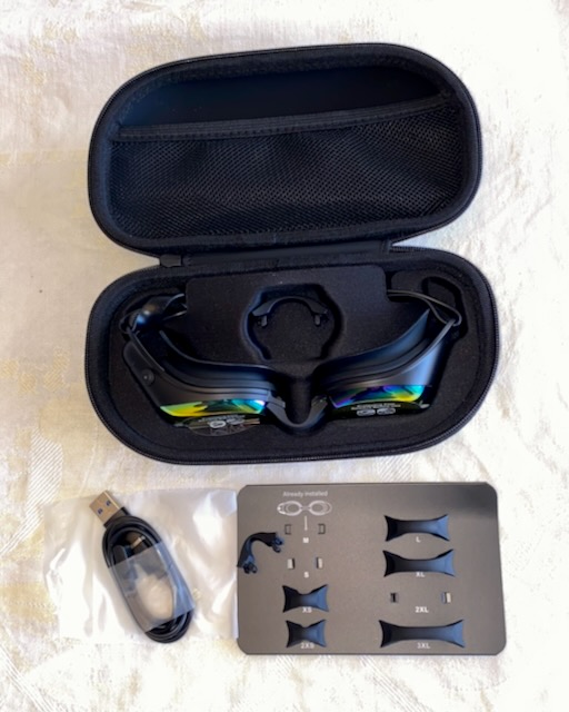 The Holoswim 3 pro box opened to show the goggles
