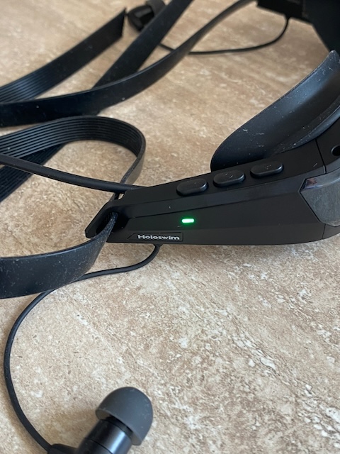 The Holoswim SollaWave green charging light
