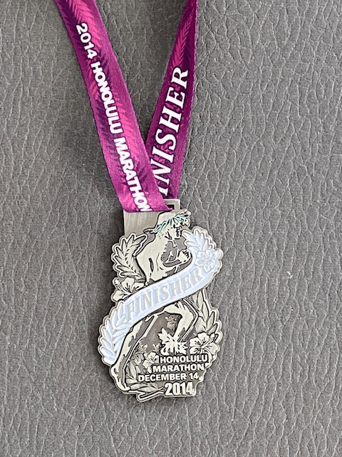 A Honolulu Marathon finisher's Medal A Honolulu Marathon finisher's Medal