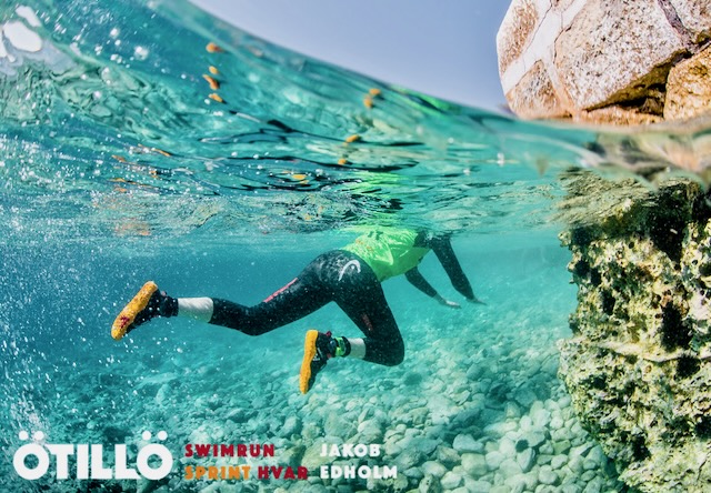 An underwater photo of a swimrunner near the end of a swim section An underwater photo of a swimrunner near the end of a swim section