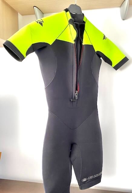 Woman's black and yellow wetsuit