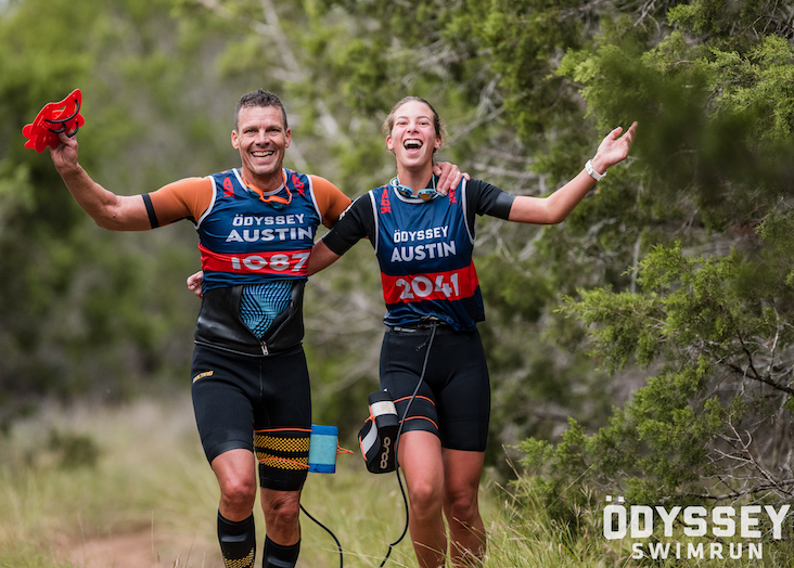 Two swimrun competitors at the Odyssey Austin 2022 event Two swimrun competitors at the Odyssey Austin 2022 event