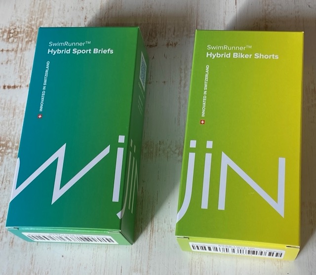 two Swijin boxes with pants and biker shorts