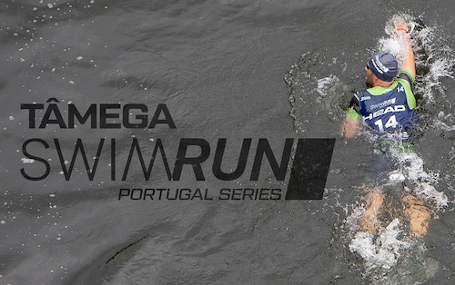 A swimrunner swimming through grey waters at the Tamega Swimrun Portugal