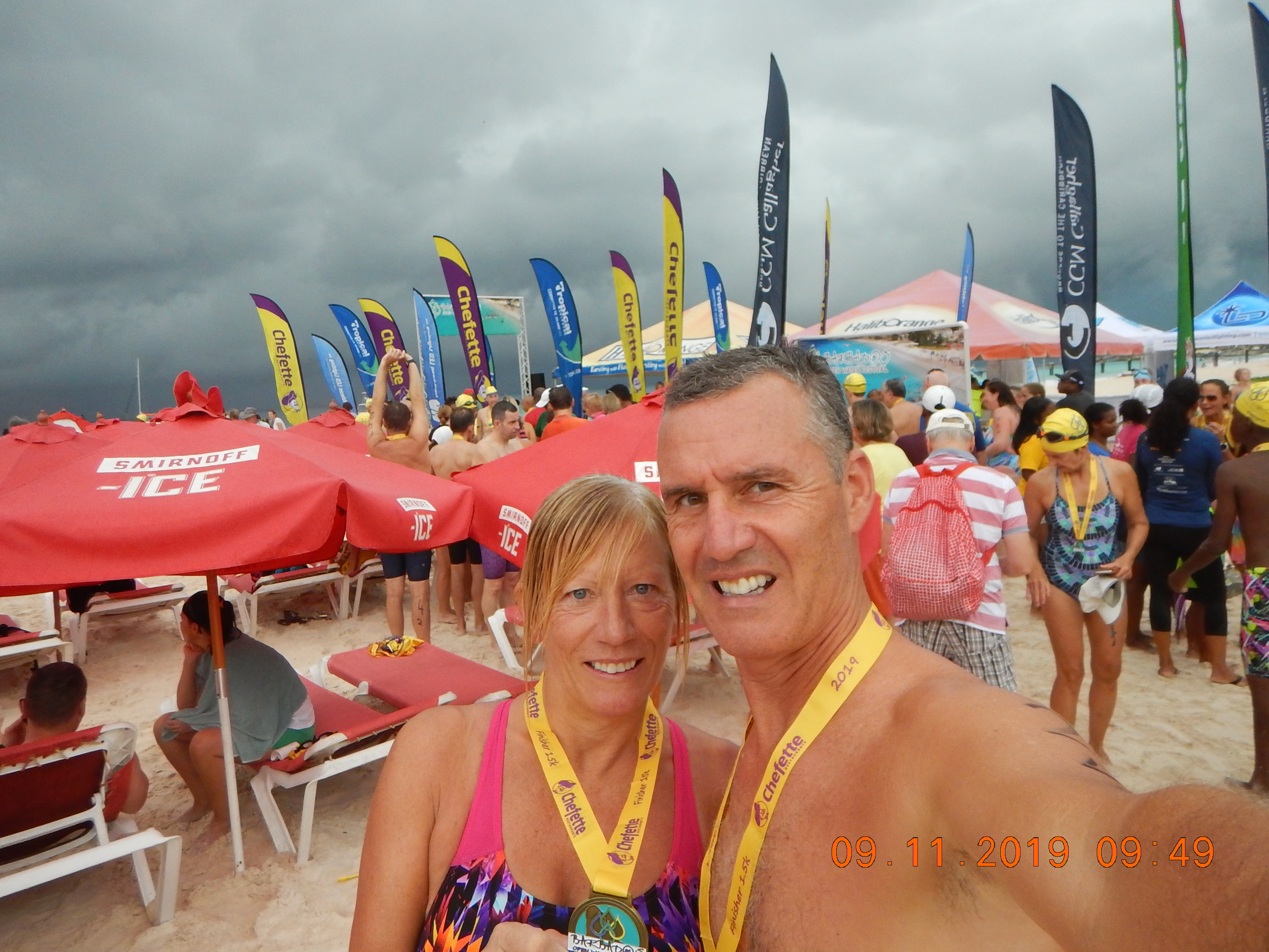 Richard and Mogsy on the beach after the swim race