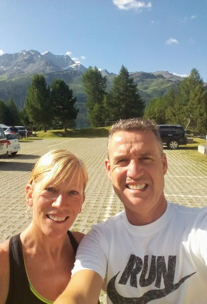 race day advice - a young couple take a selfie in a car park at Silvaplana, Switzerland, in the sunshine.