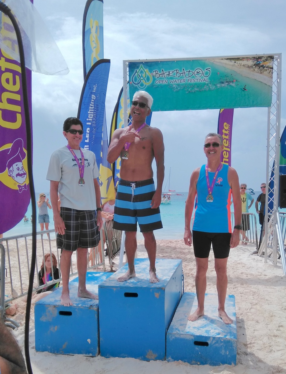 The 3 men on the Men's Over 60 podium after the 3.3km race at Barbados open water festival