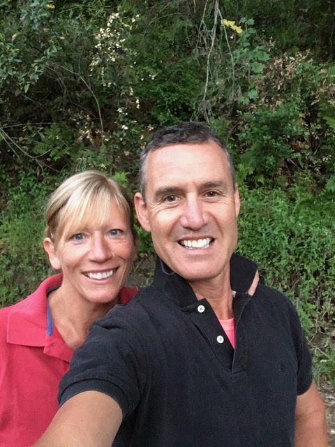 Richard and Mogsy taking a Selfie just before the start of the Big Sur International marathon, still wearing warm tops to fend off the cool morning air!