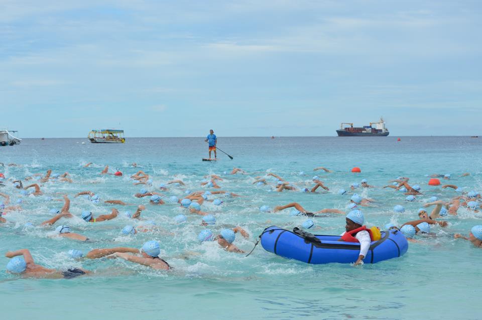 Swimmers heading off after the start at the Barbados open water festival